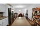 Spacious kitchen featuring granite countertops, stainless steel appliances, and ample storage at 3835 Clearwater Dr, Atlanta, GA 30349