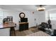 Studio style living area featuring a Murphy bed, kitchen, and seating area at 3835 Clearwater Dr, Atlanta, GA 30349
