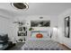 Living area featuring a Murphy bed, seating, decor, and access to the kitchen at 3835 Clearwater Dr, Atlanta, GA 30349