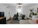 Cozy living area with a Murphy bed, seating, and decorative shelving at 3835 Clearwater Dr, Atlanta, GA 30349