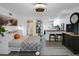 Open living space featuring a Murphy bed, and kitchen with barstool seating at 3835 Clearwater Dr, Atlanta, GA 30349