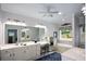 This bathroom features a double vanity, soaking tub, and decorative elements at 188 Macedonia Rd, White, GA 30184