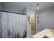 Clean bathroom with shower/tub and storage space at 188 Macedonia Rd, White, GA 30184