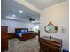Primary bedroom with hardwood furniture, blue bedding, and tray ceiling at 188 Macedonia Rd, White, GA 30184