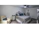 Bedroom featuring comfortable sitting area and ceiling fan at 188 Macedonia Rd, White, GA 30184