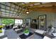 Aesthetic covered patio with TV at 188 Macedonia Rd, White, GA 30184