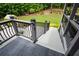 View of deck with stairs leading to lush backyard at 188 Macedonia Rd, White, GA 30184