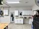Garage area featuring built-in cabinets, a sink, and plenty of countertop space for various projects at 188 Macedonia Rd, White, GA 30184