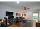 The home office has a large desk, computer setup, and cozy sofa at 188 Macedonia Rd, White, GA 30184