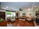 Open living room has hardwood floors, a ceiling fan, recessed lighting, and a large window at 188 Macedonia Rd, White, GA 30184