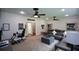 Cozy living room featuring a leather sectional, carpet floors, and recessed lighting at 188 Macedonia Rd, White, GA 30184