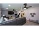 Spacious living room features a large sectional sofa, ceiling fans, and a mounted TV at 188 Macedonia Rd, White, GA 30184