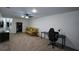 Spacious living room with carpet, ceiling fan and home office at 188 Macedonia Rd, White, GA 30184