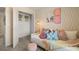 Inviting bedroom with daybed, pastel decor, and closet for ample storage at 1911 Colestock Se Ave, Conyers, GA 30094