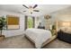 Comfortable bedroom with decorative wall and ceiling fan at 1911 Colestock Se Ave, Conyers, GA 30094
