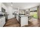 Modern kitchen featuring white cabinets, stainless steel appliances, and breakfast bar at 1911 Colestock Se Ave, Conyers, GA 30094