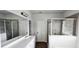 Bathroom featuring a large mirror, double sink vanity, shower, and tile accents at 1961 Ecoland Dr, Grayson, GA 30017