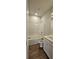 Compact bathroom features a shower-tub combo and modern vanity, maximizing space and functionality at 1961 Ecoland Dr, Grayson, GA 30017