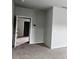 Bedroom shows carpet and open door to hallway at 1961 Ecoland Dr, Grayson, GA 30017