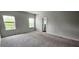 Bedroom with natural light, carpeting, and neutral walls at 1961 Ecoland Dr, Grayson, GA 30017