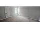 Empty bedroom with carpet and natural light at 1961 Ecoland Dr, Grayson, GA 30017