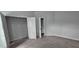 Bedroom view showcasing a large closet with shelving for ample storage at 1961 Ecoland Dr, Grayson, GA 30017