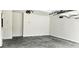 Garage features clean floors, painted walls and ample space at 1961 Ecoland Dr, Grayson, GA 30017