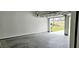 Garage with concrete floors and an open view to the exterior at 1961 Ecoland Dr, Grayson, GA 30017