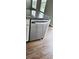 Kitchen island featuring granite countertop and stainless steel dishwasher at 1961 Ecoland Dr, Grayson, GA 30017
