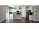 A bright kitchen with a large island, stainless appliances, and ample cabinet space is an ideal setup at 1961 Ecoland Dr, Grayson, GA 30017