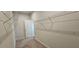 Spacious walk-in closet featuring wire shelving for optimal storage and organization at 1961 Ecoland Dr, Grayson, GA 30017