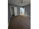 Bedroom featuring neutral walls, white trim and plush, neutral carpeting at 2802 3Rd Sw Ave, Atlanta, GA 30315