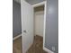 Spacious bedroom with neutral walls, plush carpet, ceiling fan, and closet for a comfortable space at 2802 3Rd Sw Ave, Atlanta, GA 30315