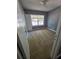 Bright bedroom with neutral walls, plush carpet, and natural light, perfect for a modern, comfortable space at 2802 3Rd Sw Ave, Atlanta, GA 30315
