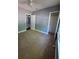 Bedroom showcasing closet space, plush carpeting, and a ceiling fan at 2802 3Rd Sw Ave, Atlanta, GA 30315