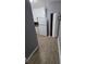 The kitchen features white cabinets, a white refrigerator, and wood-look flooring at 2802 3Rd Sw Ave, Atlanta, GA 30315
