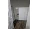 A small laundry room with dark wood-look flooring at 2802 3Rd Sw Ave, Atlanta, GA 30315
