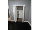 A small laundry room with dark wood-look flooring at 2802 3Rd Sw Ave, Atlanta, GA 30315