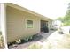 Backyard exterior view of siding and a patio with privacy screening at 414 Norton Xing, Woodstock, GA 30188