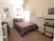 Cozy bedroom featuring a comfortable bed, neutral walls, and natural light at 414 Norton Xing, Woodstock, GA 30188