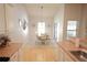 Bright dining room with vaulted ceilings, and hardwood floors at 414 Norton Xing, Woodstock, GA 30188