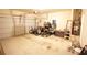 A large two car garage with white door, and space for storage and tools at 414 Norton Xing, Woodstock, GA 30188