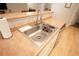 Kitchen sink with stainless steel sink and peach countertops at 414 Norton Xing, Woodstock, GA 30188