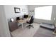 Bright home office with a desk, monitors, natural light, and a dog bed at 414 Norton Xing, Woodstock, GA 30188