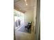 Cozy screened porch with string lights, modern furniture, and a stylish patterned rug at 414 Norton Xing, Woodstock, GA 30188
