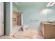 Clean bathroom features tile flooring, tile shower and neutral paint at 4829 Moon Rd, Powder Springs, GA 30127
