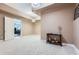Spacious bedroom with tray ceilings, recessed lighting and view to bathroom and living area at 4829 Moon Rd, Powder Springs, GA 30127