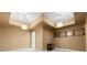 Bedroom showcasing tray ceilings, pendant lighting, and modern wall art at 4829 Moon Rd, Powder Springs, GA 30127