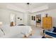 Bedroom suite featuring carpet flooring, neutral paint, and access to other rooms at 4829 Moon Rd, Powder Springs, GA 30127