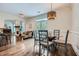 Dining room adjacent to the kitchen, open to the living room with access to the backyard at 4829 Moon Rd, Powder Springs, GA 30127